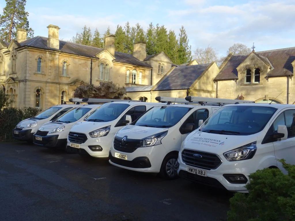 Philip Cheeseman and Sons branded van fleet ready to attend jobs in Chippenham